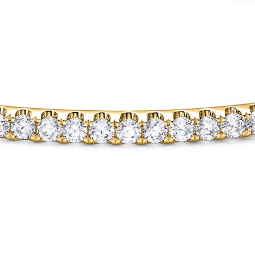 Ladies' gold bangle with diamonds