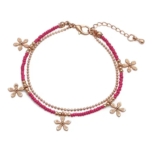 Dames armband fantasiejuwelen in goud/roze