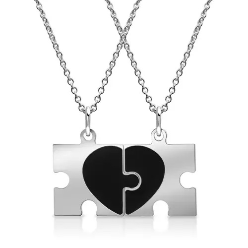 Silver necklace with partner pendants puzzle pieces