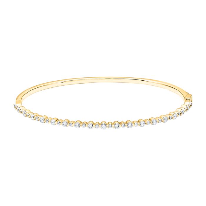 Hinged ladies&#x27; bangle in gold with diamonds