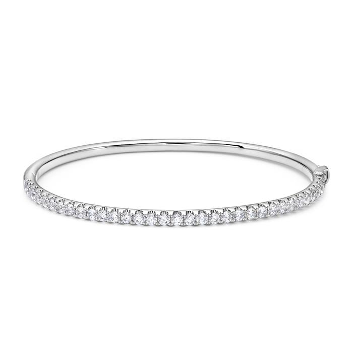 White gold or platinum bangle with diamond setting