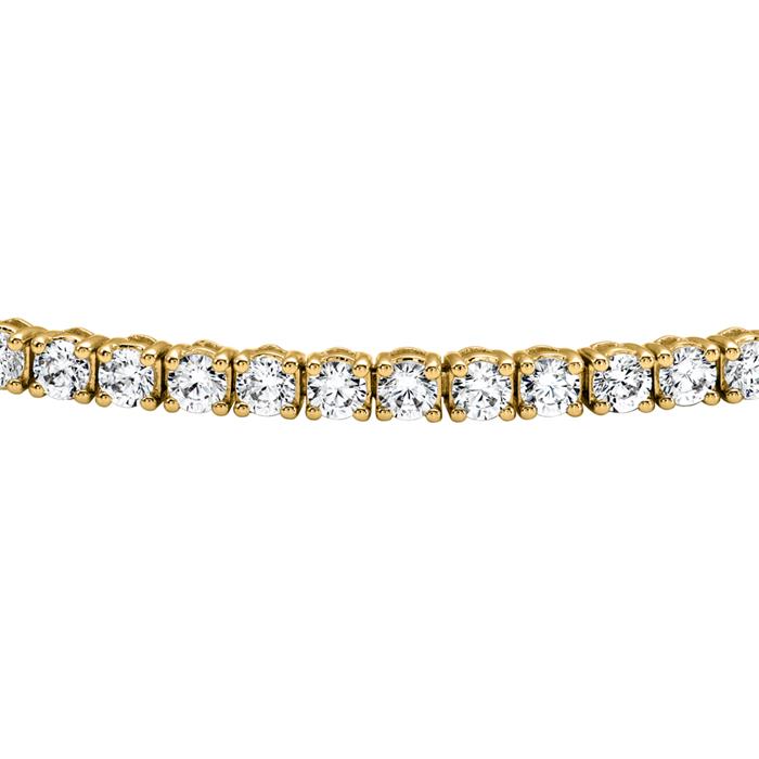 Ladies&#x27; gold tennis bracelet with diamonds