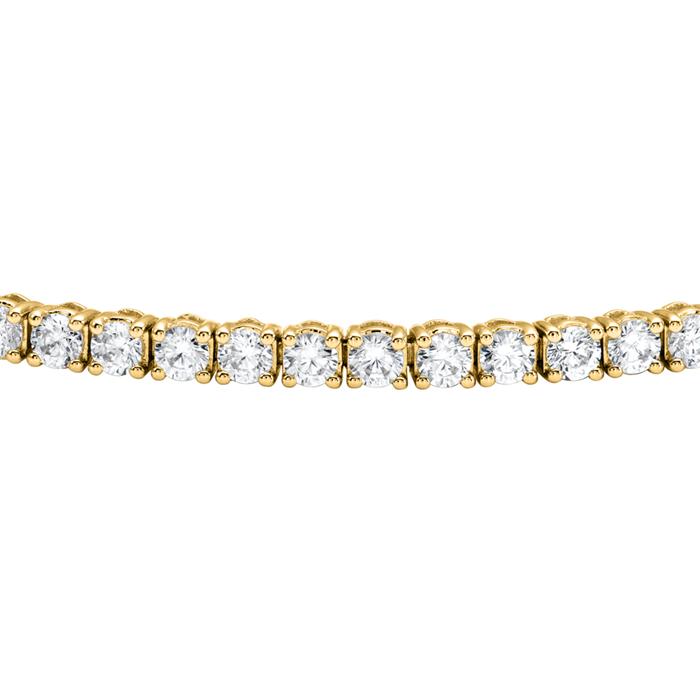 Ladies&#x27; gold tennis bracelet with diamonds