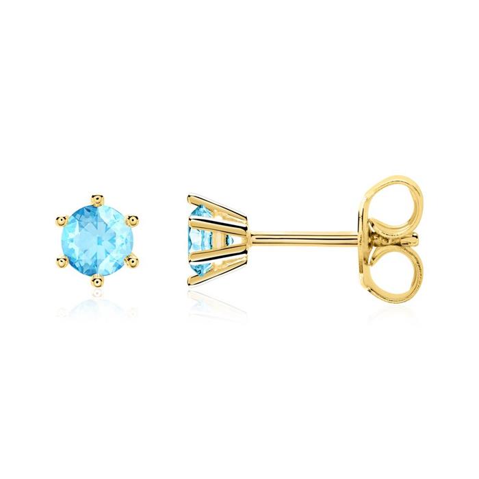 Stud earrings for ladies in 14 carat gold, blue topaz