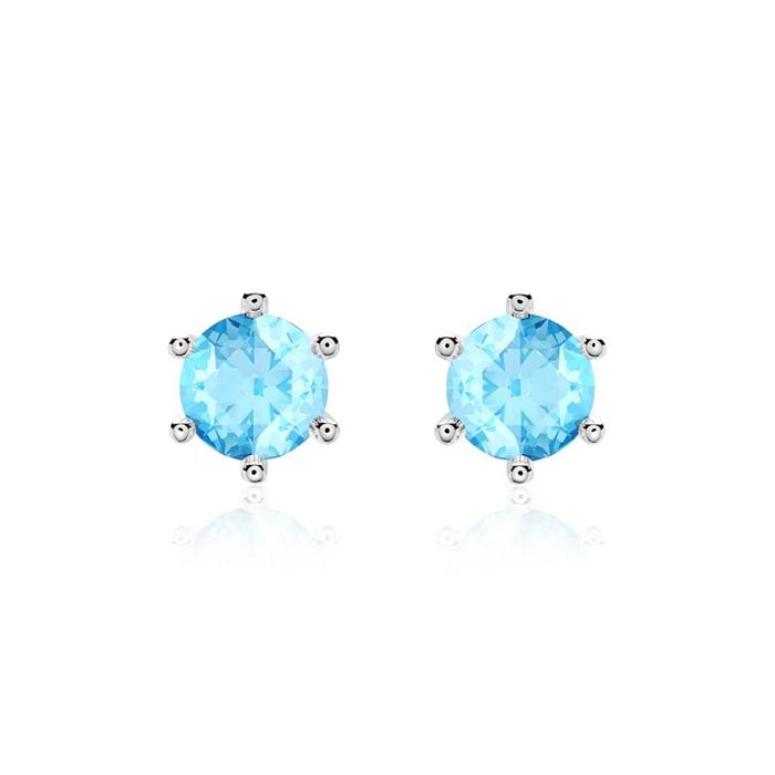 Ladies stud earrings in 14K white gold with blue topazes