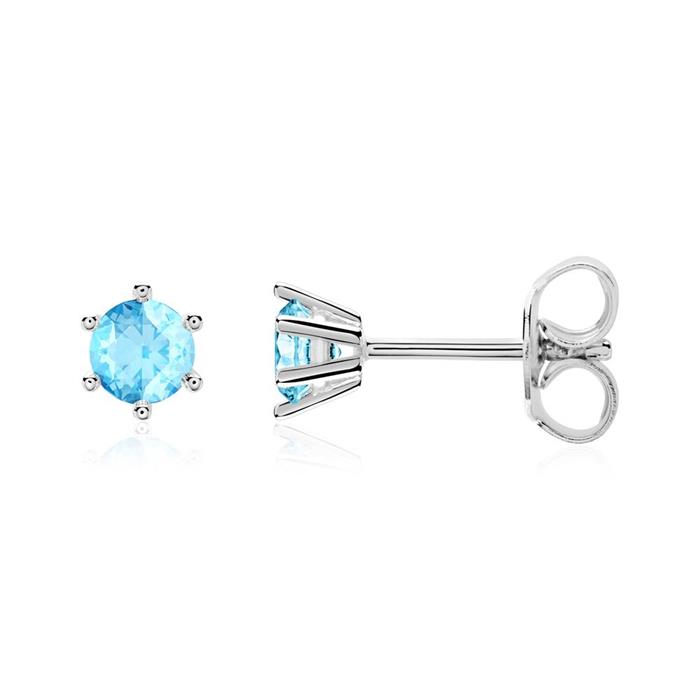 Ladies stud earrings in 14K white gold with blue topazes