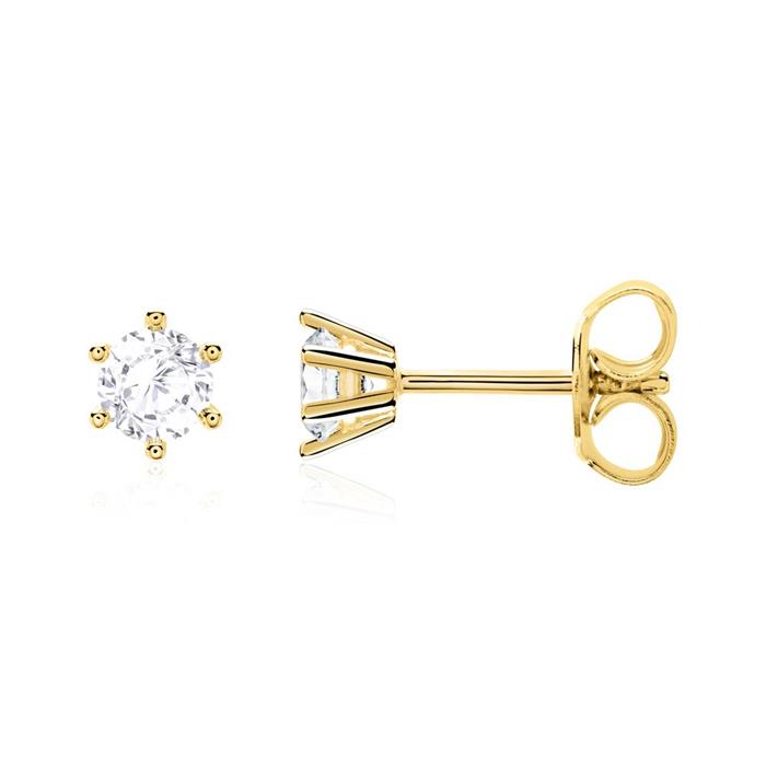 Ladies white topaz stud earrings in 14 carat yellow gold