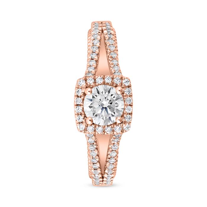 Halo engagement ring with diamonds in rose gold