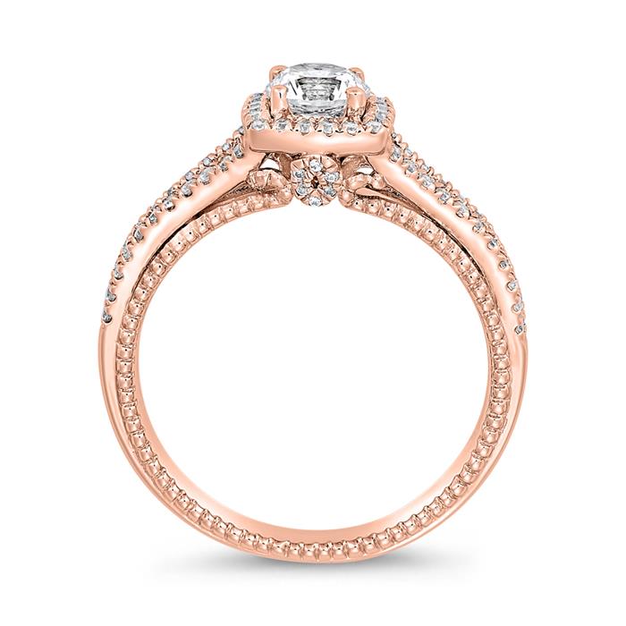 Halo engagement ring with diamonds in rose gold