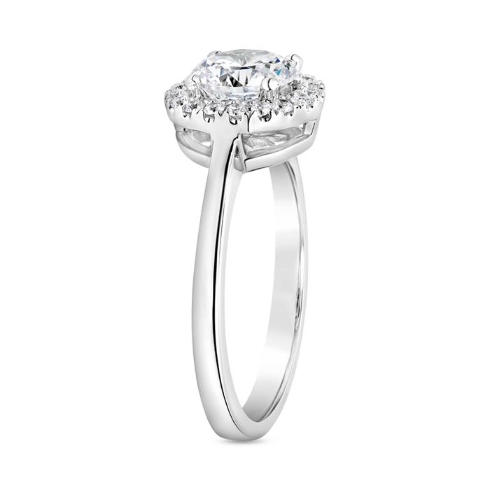 Halo engagement ring with diamonds in white gold, platinum