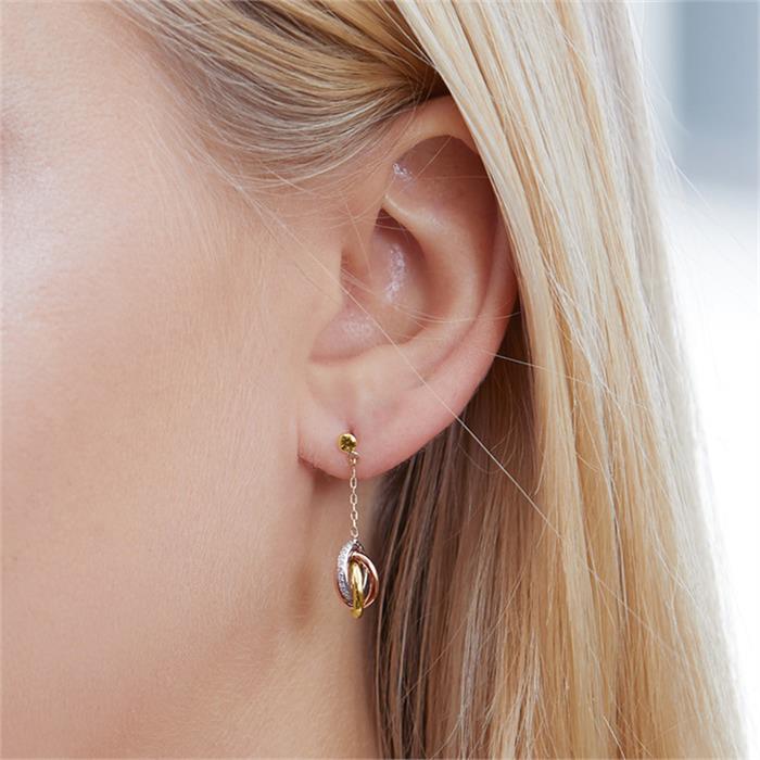 Ear studs in 14ct gold tricolor with diamonds