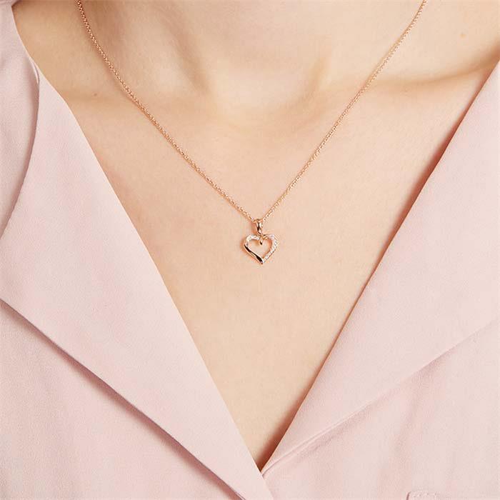 Heart pendant in 14ct rose gold with diamonds