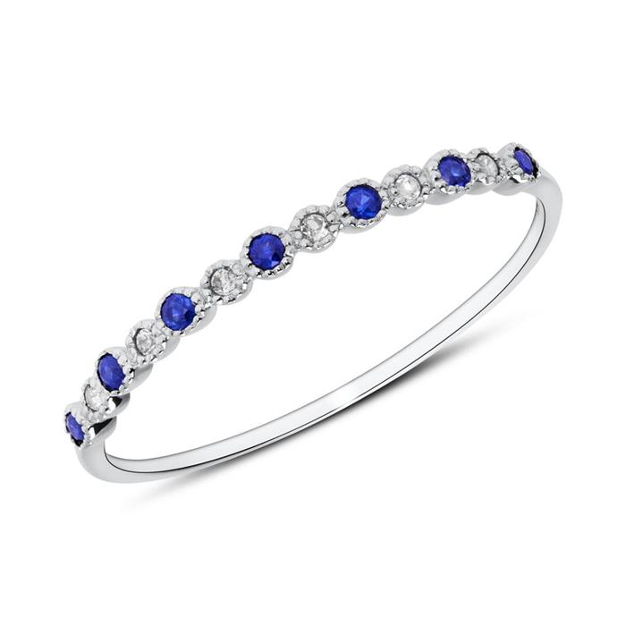 Ring in 585 white gold with sapphires and white topazes