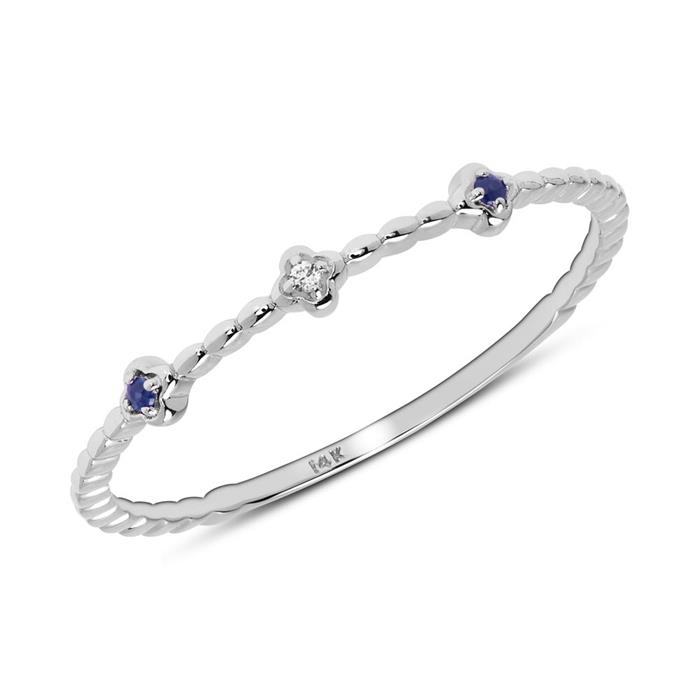 14ct white gold ring with sapphires and white topaz