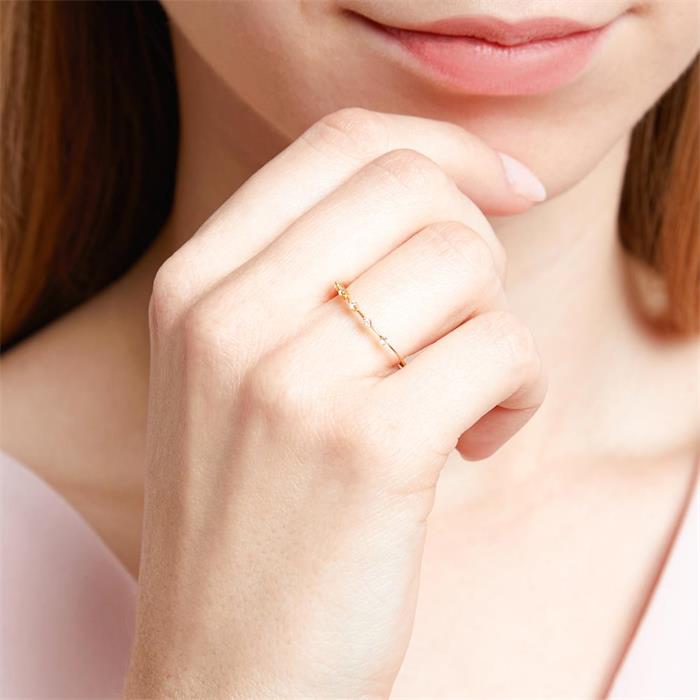 Ring for ladies in 14K gold with white topazes
