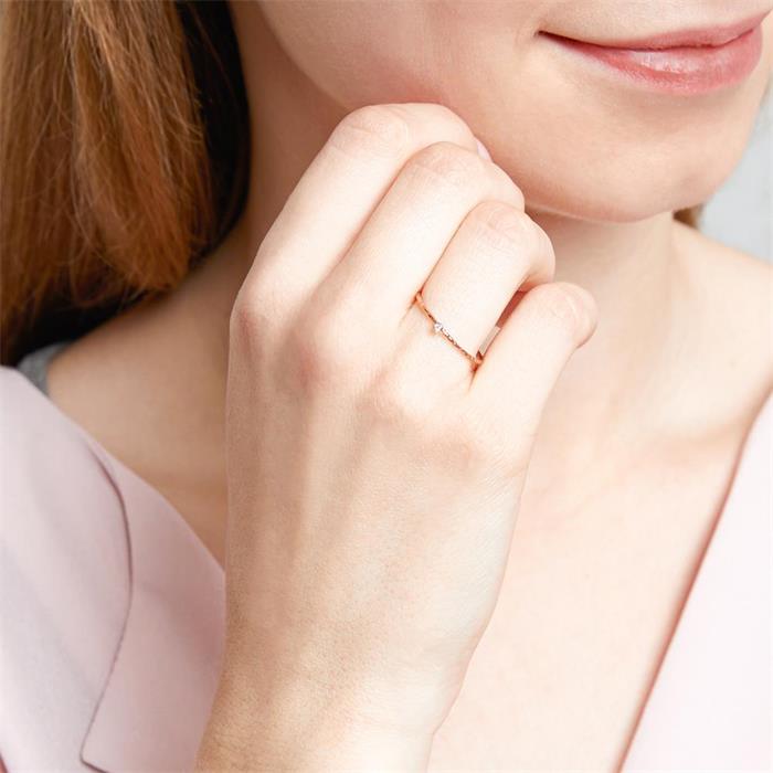 Ladies ring in 14K rose gold with white topaz