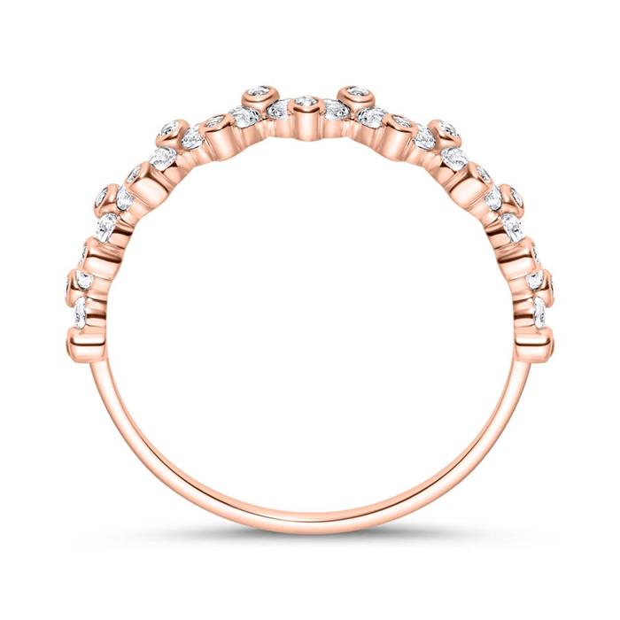 Ring for ladies in 14K rose gold with white topazes