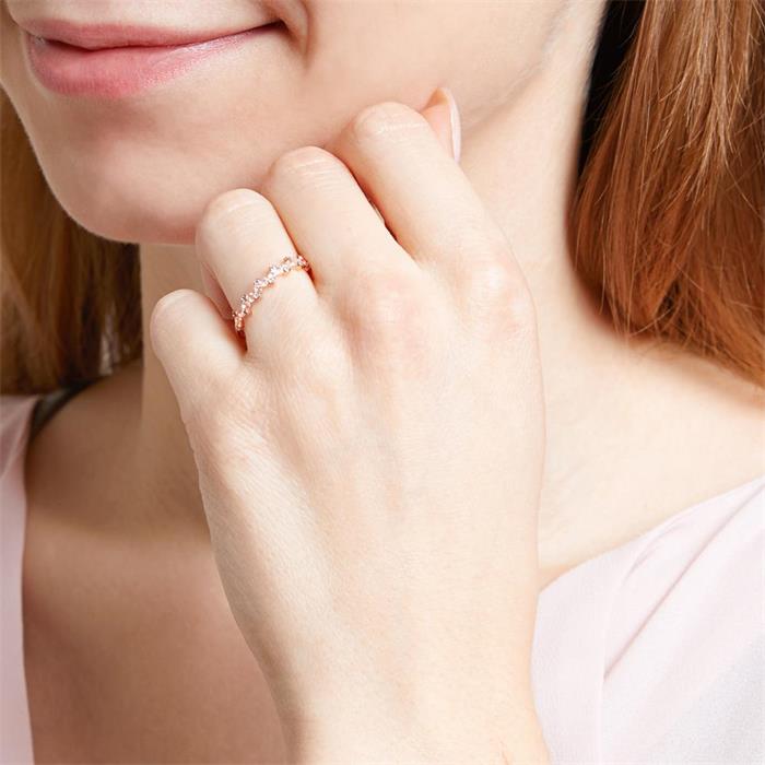 Ring for ladies in 14K rose gold with white topazes