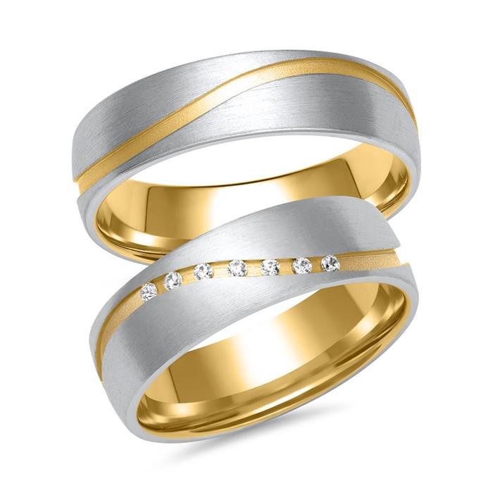 Wedding rings in yellow and white gold with 7 diamonds