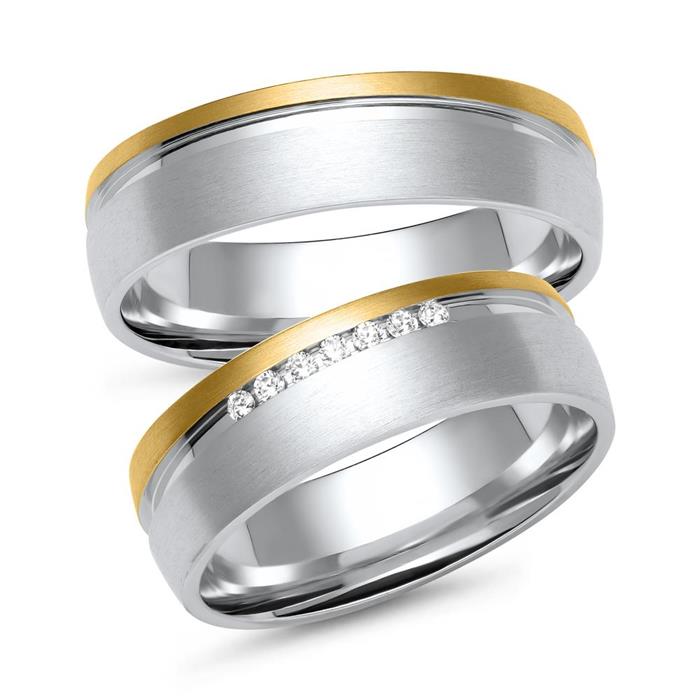 Wedding rings in white and yellow gold with 7 diamonds