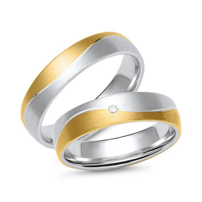 Wedding rings in white and yellow gold with diamond