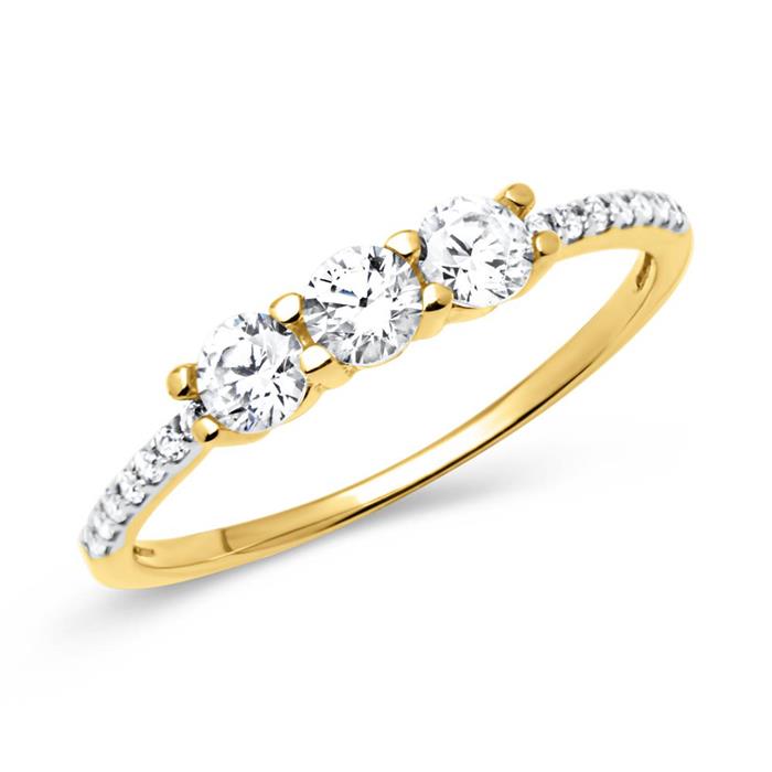Delicado anillo de oro auténtico con piedras blancas