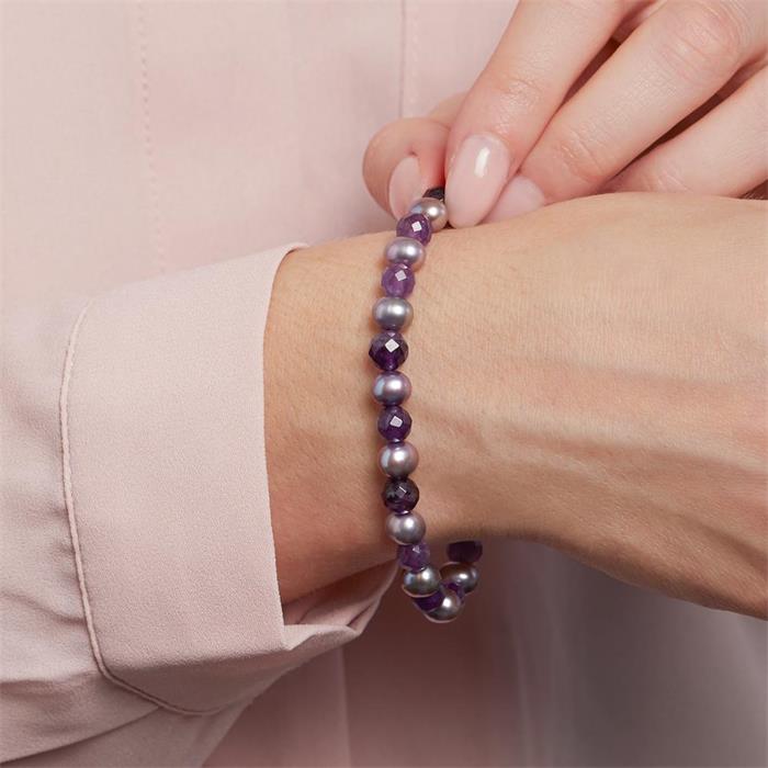 Beautiful White Pearl Bracelet On A Purple Textile Background Close Up  Stock Photo  Download Image Now  iStock