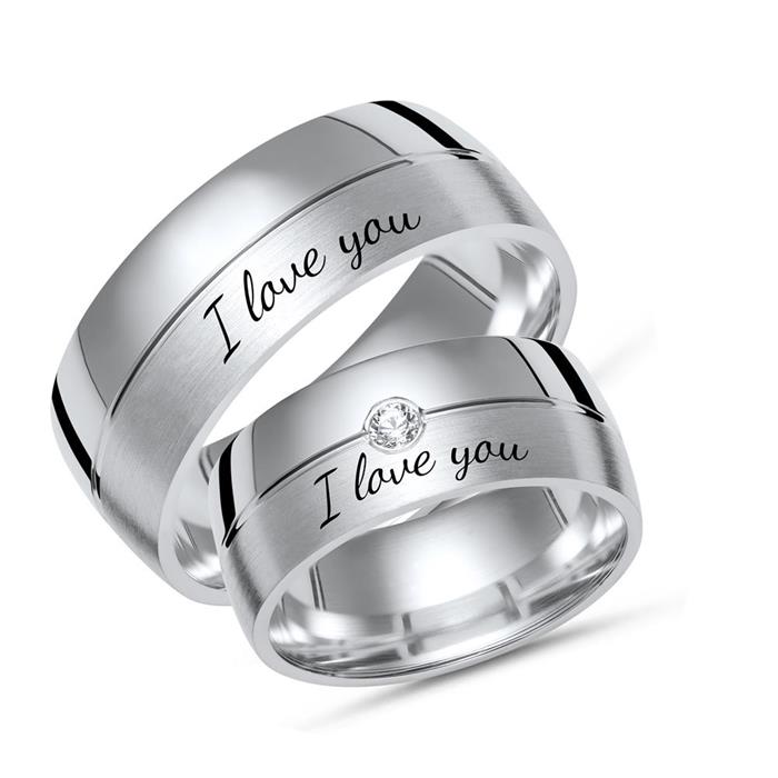 Silver wedding rings with laser engraving partly polished
