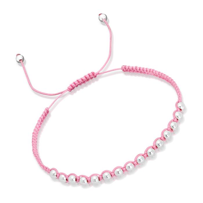 Pulsera textil rosa con elementos plateados