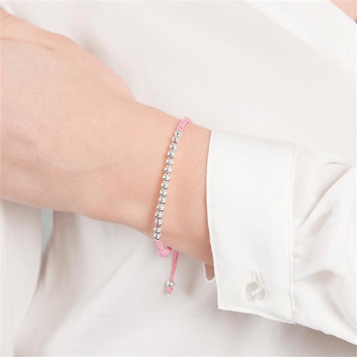 Pinkfarbenes Textilarmband mit Silberelementen