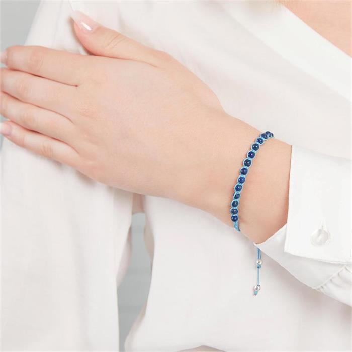 Blauwe textiel armband met zilveren elementen