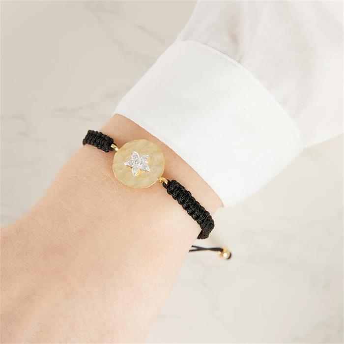 Textile bracelet with silver flower pendant