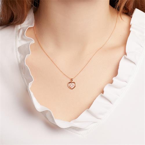 Heart pendant in 14ct rose gold with diamonds