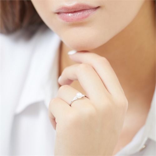 585er Weißgold-Ring Perle 4 Diamanten 0,032 ct.