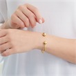 Open bangle made of gold-plated stainless steel