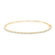 Hinged ladies' bangle in gold with diamonds