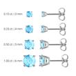Ladies stud earrings in 14 carat white gold with blue topazes