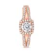 Halo engagement ring with diamonds in rose gold