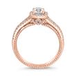 Halo engagement ring with diamonds in rose gold