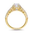 Golden engagement ring set with diamonds