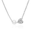 14K white gold necklace with diamond set heart and pearl