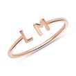 14ct. rose gold ring with letters or symbols