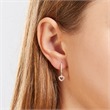 Rose gold plated sterling silver hoops with zirconia