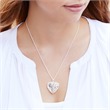 Heart-shaped locket in sterling silver