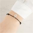 Adjustable textile bracelet with silver pendant